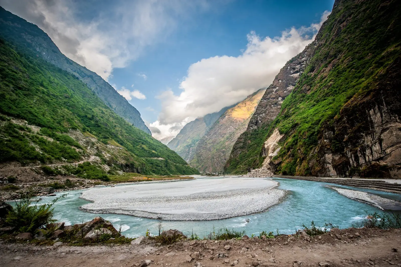 Turquoise river in a green gorge on the approach to Annapurna