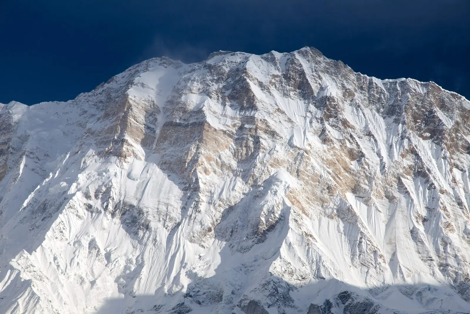 Sunlit snow face of Annapurna I at 8,091 metres